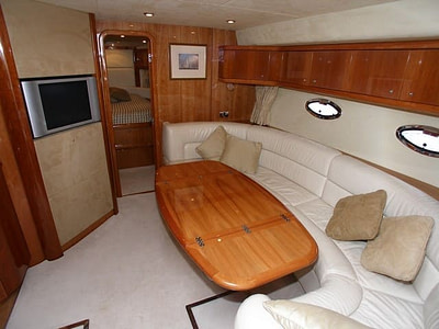 Indoor lounge and TV area of motor yacht prestige 50