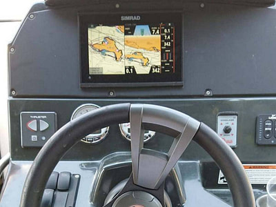 Steering wheel details on a Quicksilver 805 speedboat