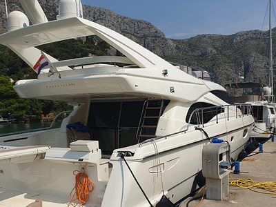 Stern view of a Ferretti 591 docked in Dubrovnik