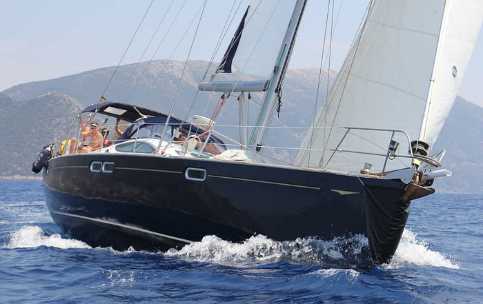Side view of a Sun Odyssey 54 sailing in the sea